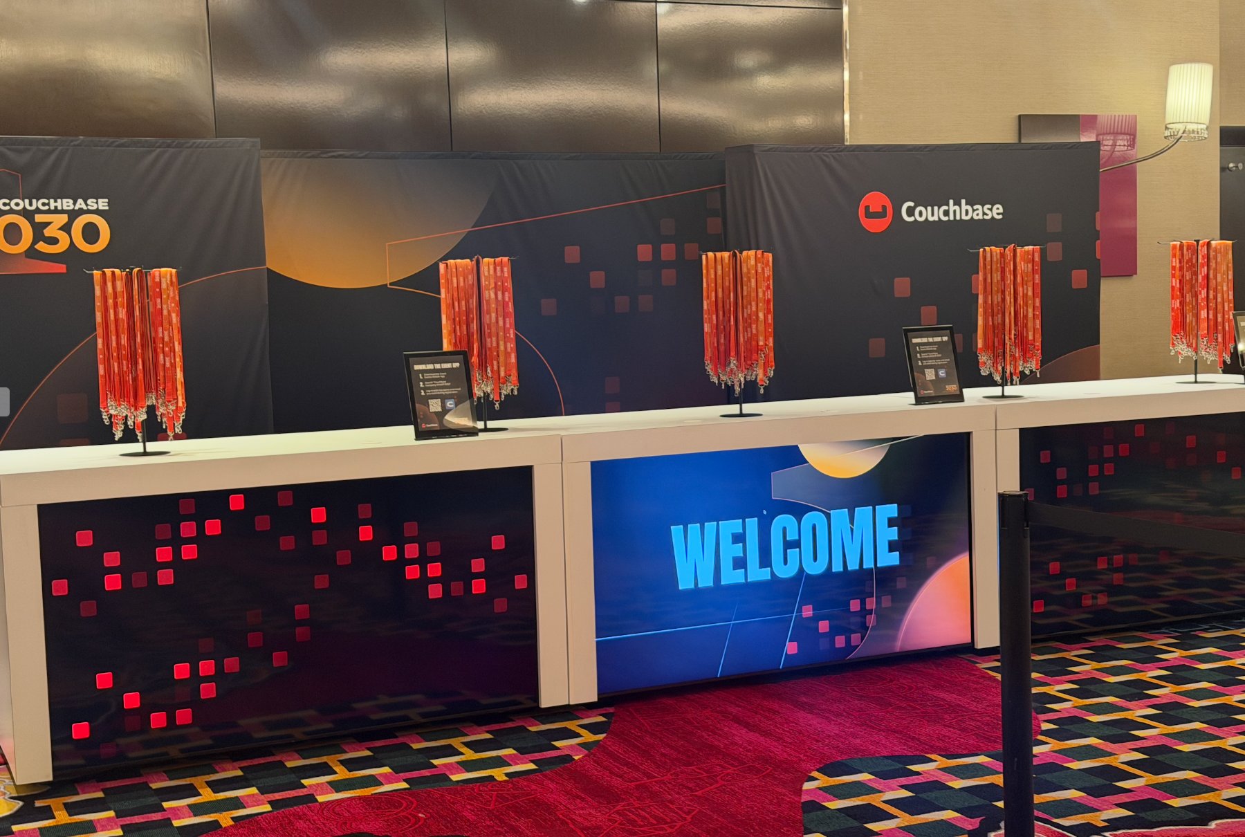 Branded registration desk and welcome screens