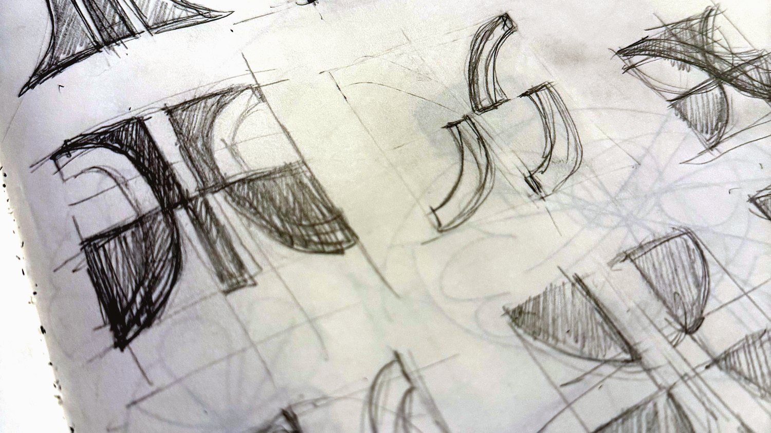 Sketchbook page of looping infinity and bracket explorations