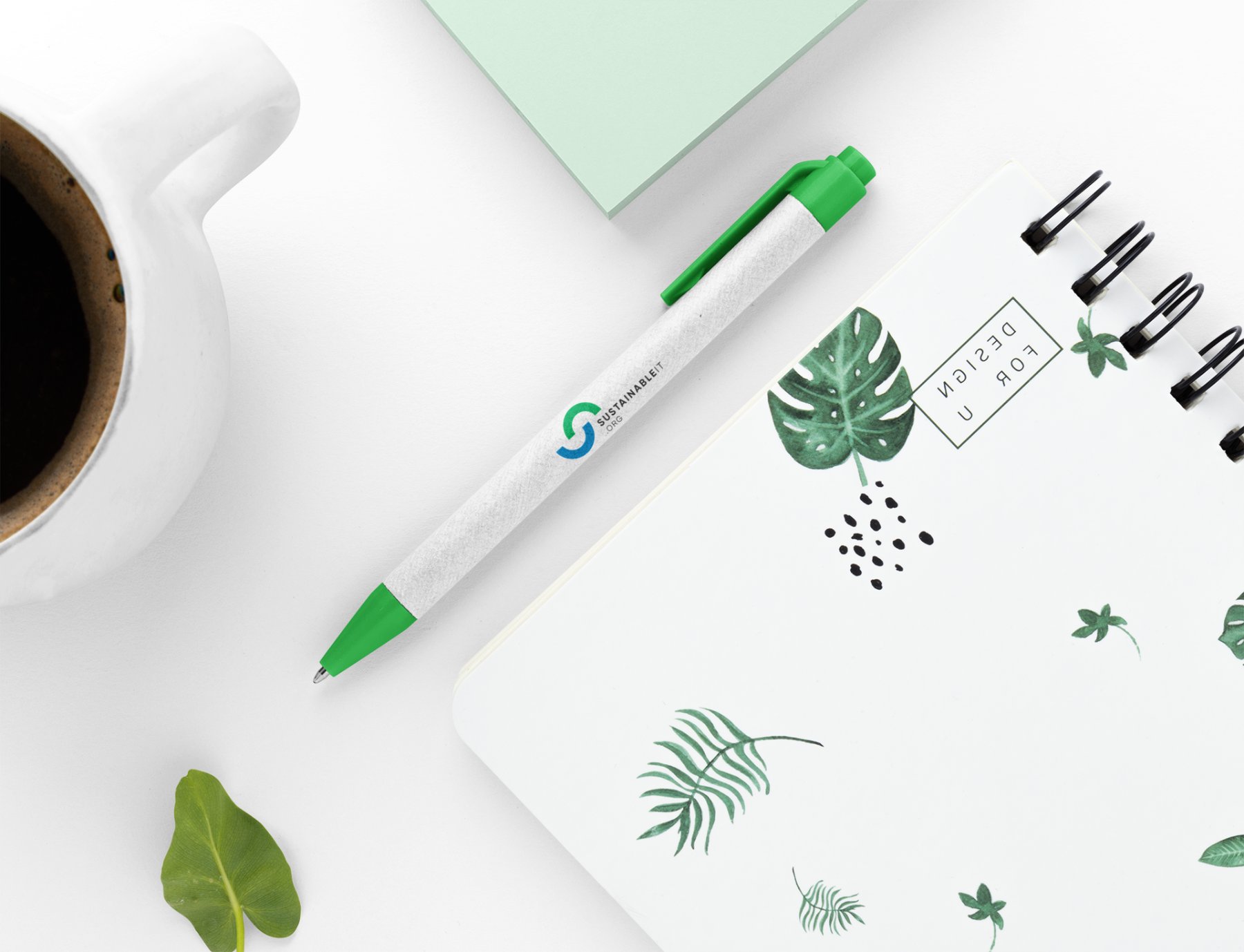 Eco-friendly SustainableIT.org branded pen on a desk